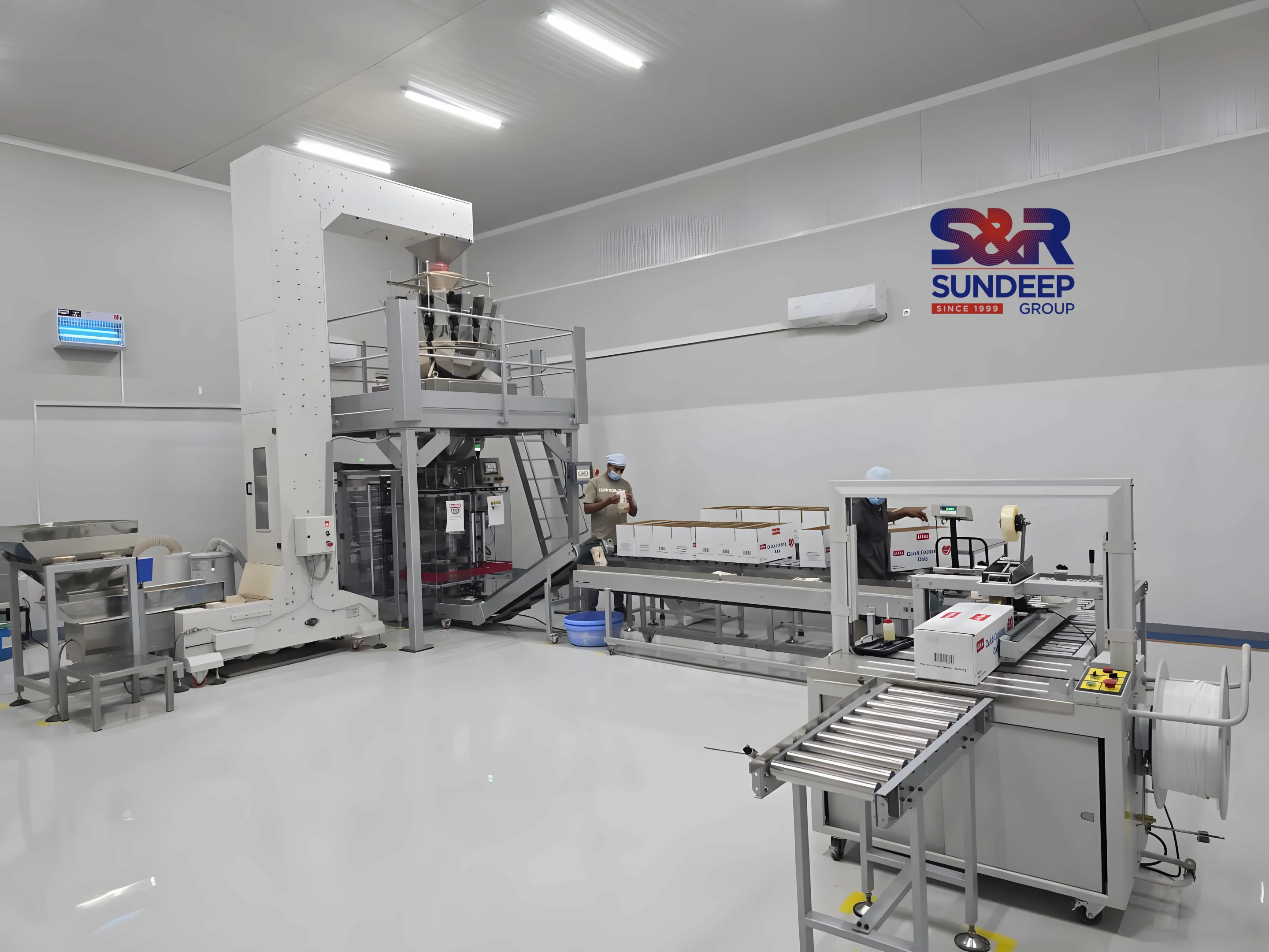 Weighing and packing line, Luanda packaging units