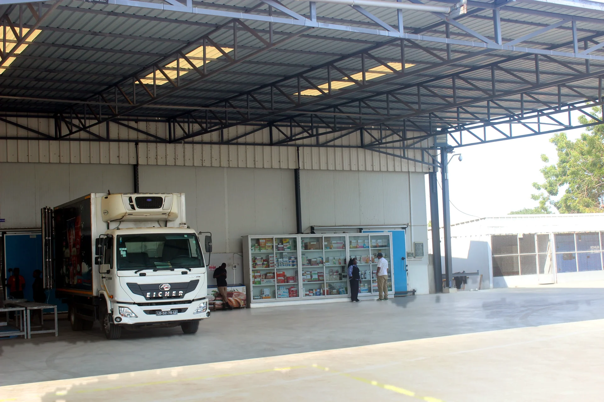 Loading at an S&R warehouse, Angola