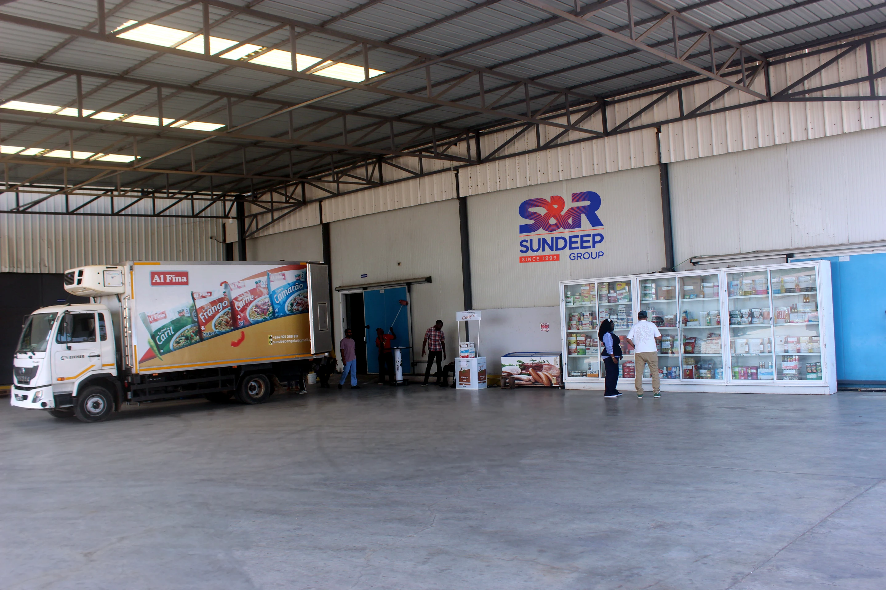 S&R warehouse and trucks, Angola